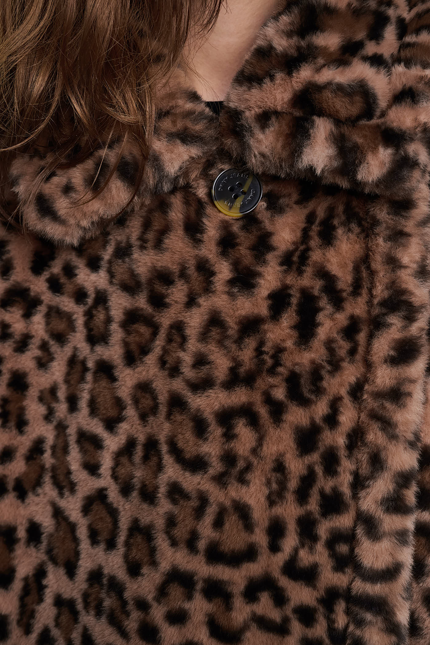 ASYMMETRICAL FAUX FUR PONCHO